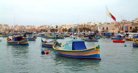 Marsaxlook Harbour and colourful Maltese fishing boats